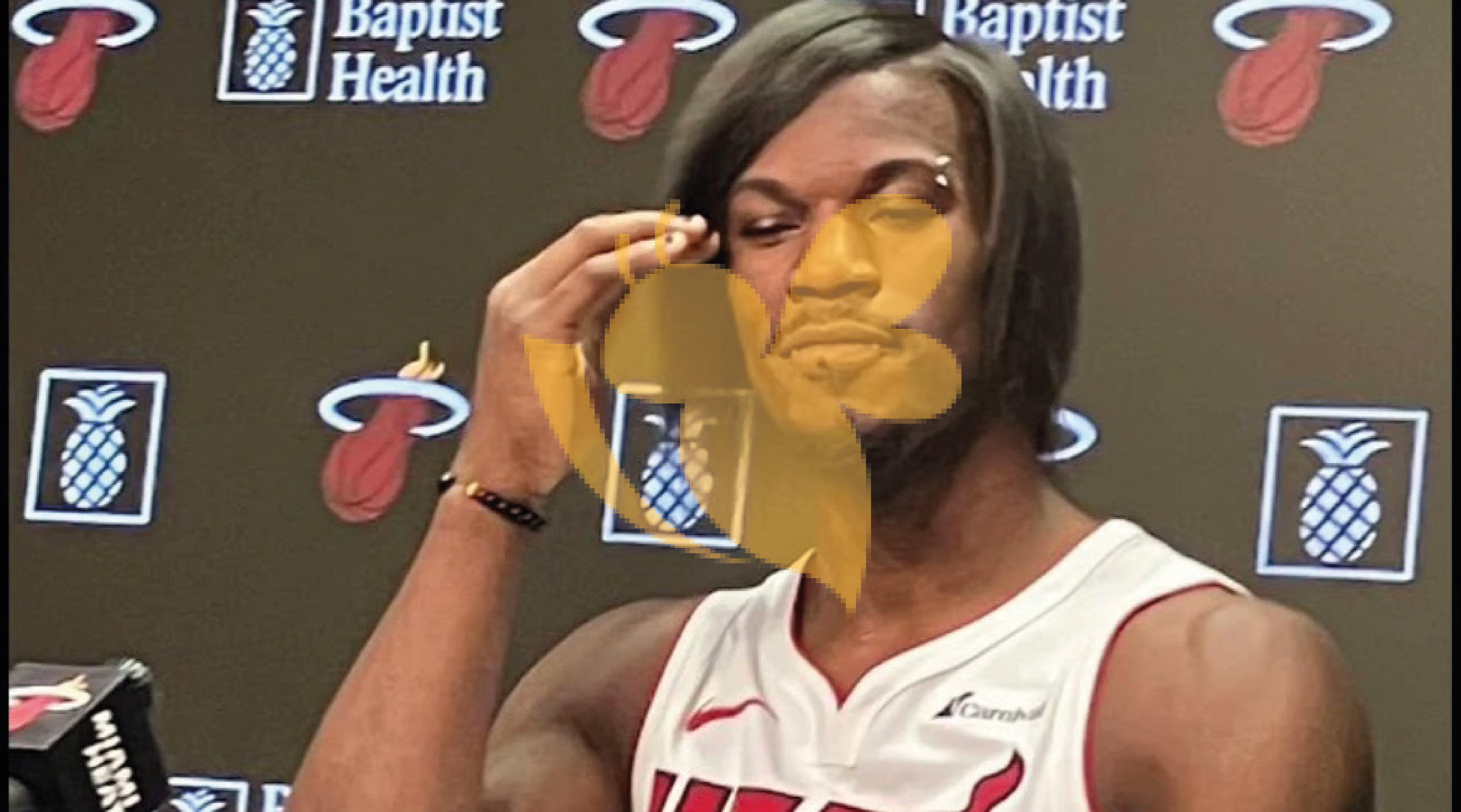 Jimmy Butler showed upat Heat media day with new look