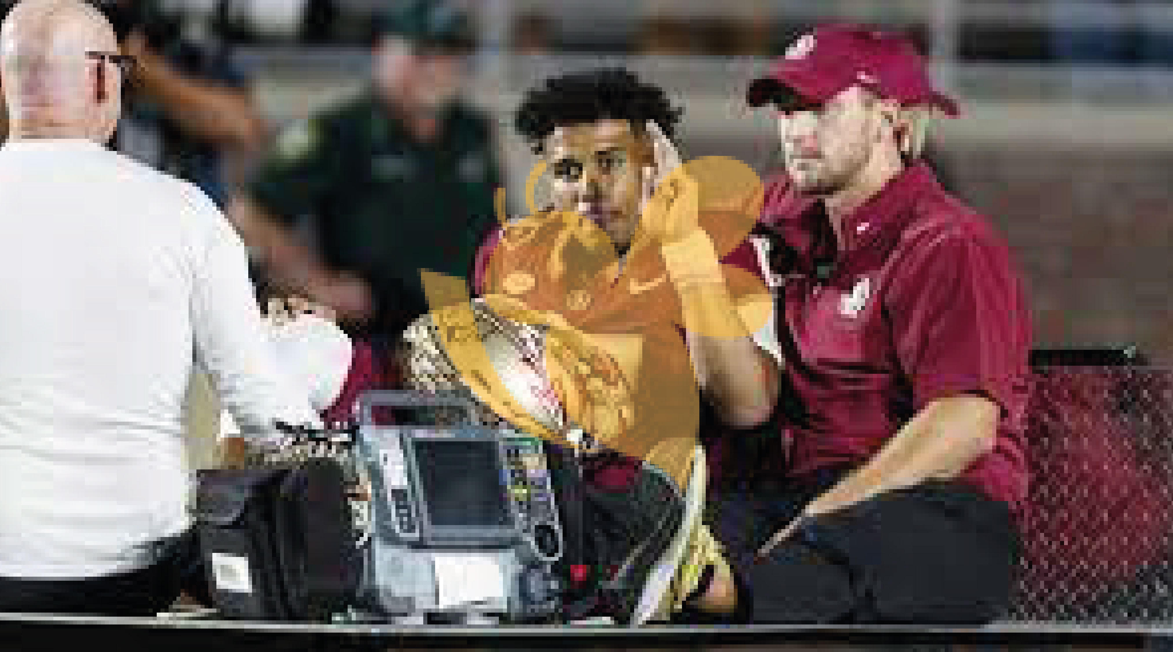 Jordan Travis Florida State star suffering serious injury