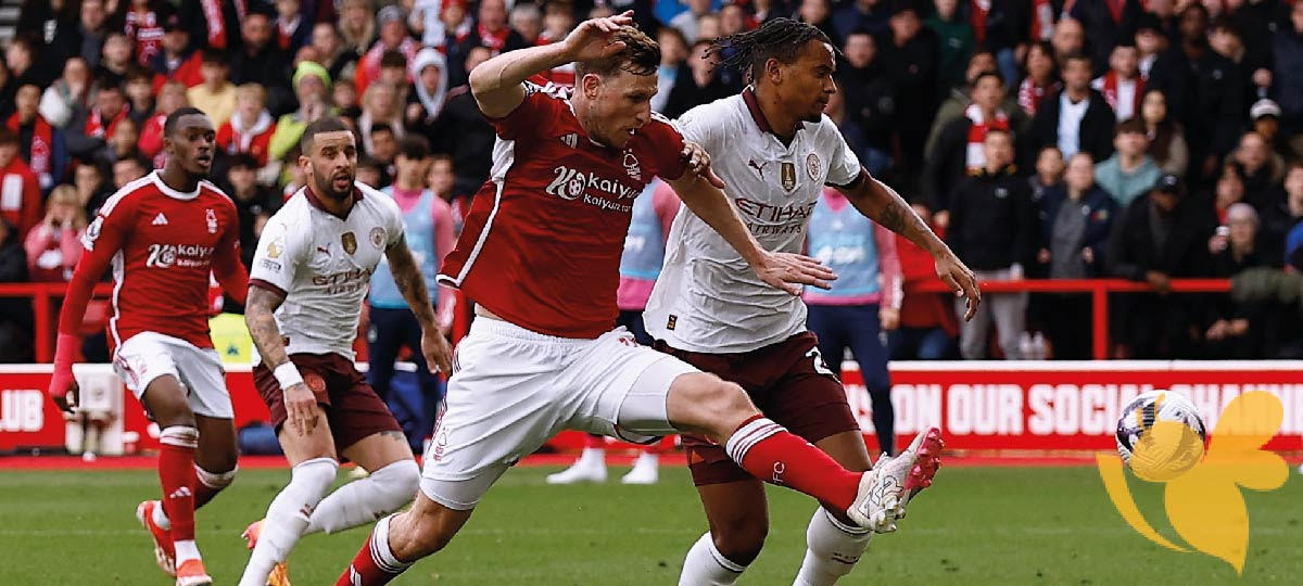 Man City keep pressure on Arsenal with win over Forest 0-2